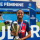 Laurina Fazer holds the Coupe de France Féminine trophy after Paris Saint-Germain won the competition in 2024.