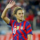 USWNT forward Carli Lloyd waves to the crowd.