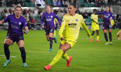 Trinity Rodman chips the ball ahead to a teammate during the 2024 NWSL Championship.