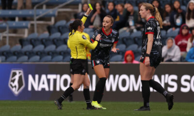 Chicago midfielder Julia Grosso argues a call with a referee.