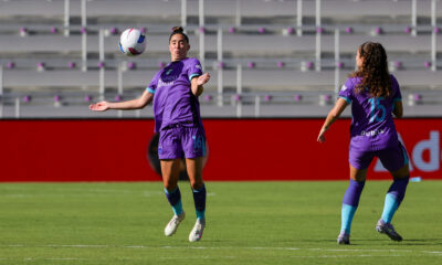 Morgan Gautrat and Angelina win the ball during the Orlando Pride's match against the Washington Spirit at Inter&Co Stadium in April.